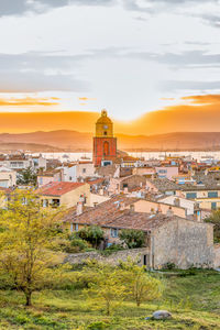 Scenic view of saint tropez in cote d'azur in south of france against yellow summer sunset