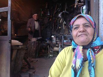 Portrait of a smiling young woman standing outdoors