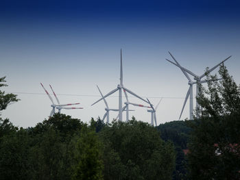 Traditional windmill against sky