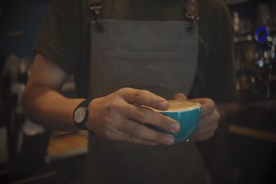 Man holding coffee cup