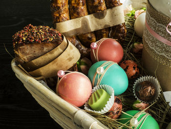 Close-up of food and decoration in easter basket