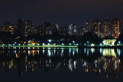 Reflection of illuminated buildings in water