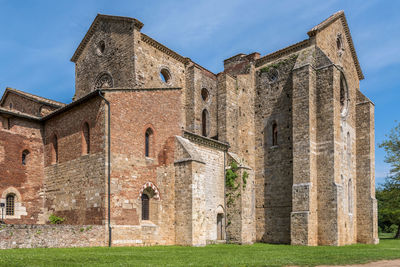 Low angle view of old building against sky