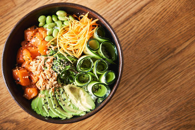 High angle view of chopped vegetables in bowl on table