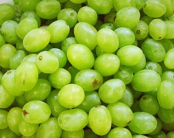 Full frame shot of green apples in market