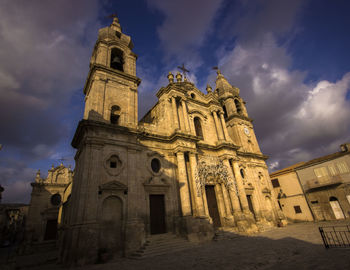 Low angle view of historic building against sky at dusk in palma di montechiaro sicily 