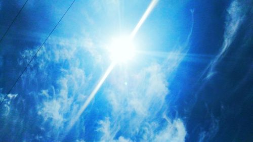 Low angle view of vapor trails in sky