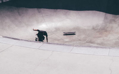 High angle view of man standing on venice skatepark