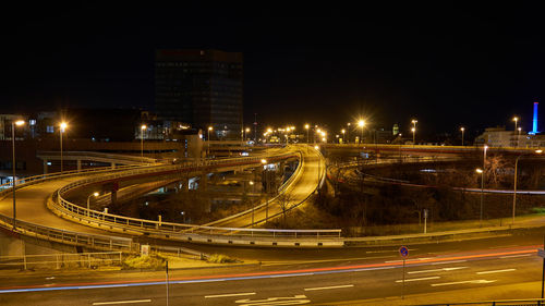 High angle view of light trails on road at night