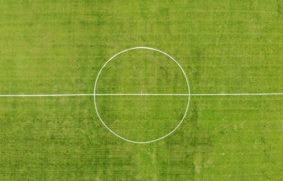 Full frame shot of green grass soccer field