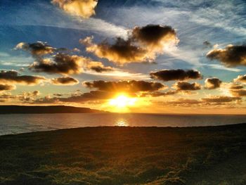 Scenic view of sea against sky during sunset