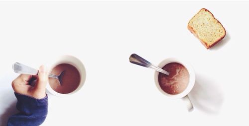 Close-up of coffee holding coffee cup