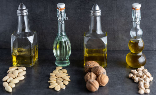 Close-up of wine bottles on table