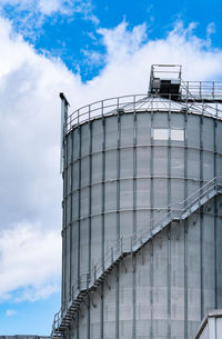 Agricultural silo at feed mill factory. big tank for store grain in feed manufacturing. seed stock.