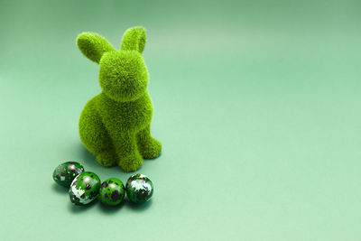Close-up of christmas decorations on blue background