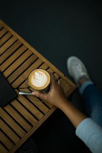 High angle view of coffee cup on table