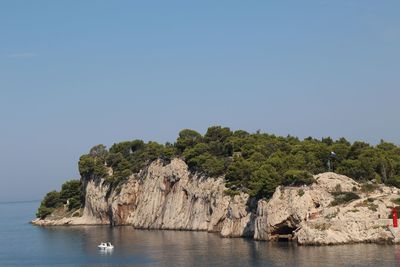 Scenic view of sea against clear sky