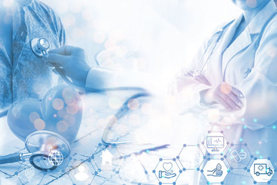 Cropped hand of scientist working on table