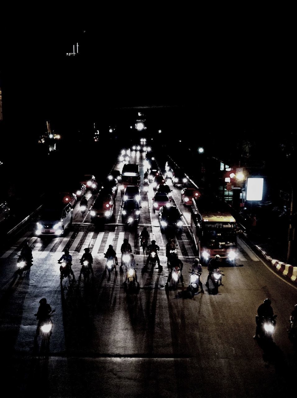 transportation, night, illuminated, street, land vehicle, car, architecture, building exterior, mode of transport, built structure, city, city life, city street, road, large group of people, men, on the move, walking, street light