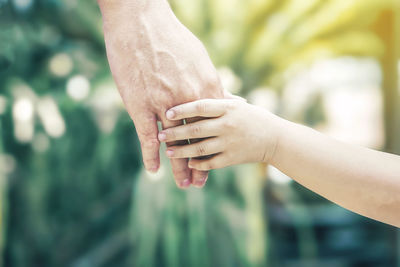 Close-up of couple hands