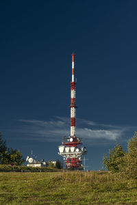 Low angle view of windmill against clear sky