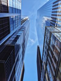 Low angle view of modern buildings against sky