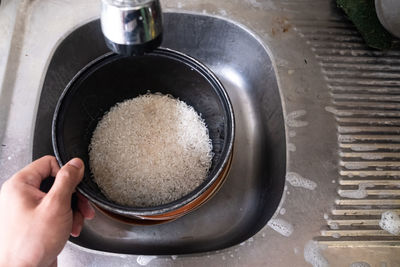 High angle view of person preparing food in kitchen