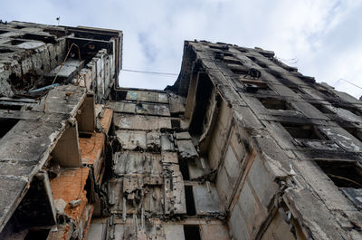 Low angle view of old building against sky