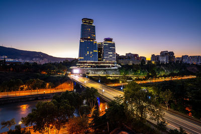 Illuminated buildings in city