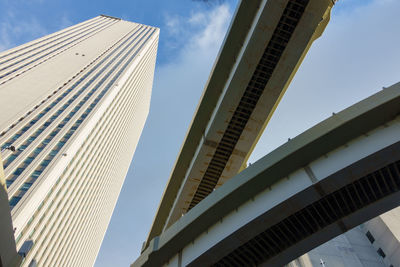Low angle view of skyscrapers against sky