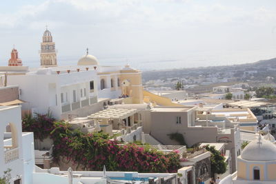 High angle view of white buildings against sky