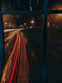 Light trails on street in city at night