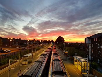 High angle view of train against sky at sunset