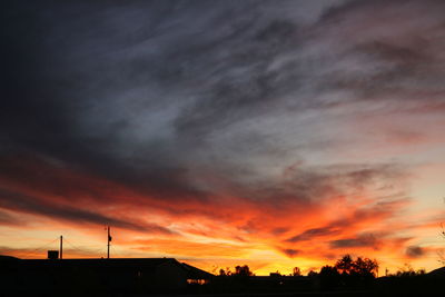 Low angle view of dramatic sky during sunset