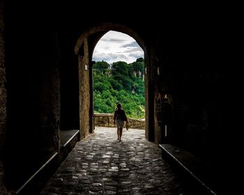 People walking in tunnel