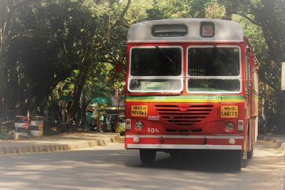 Red truck on road in city