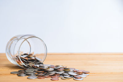 Close-up of coins on table