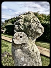 Close-up of statue against blurred background