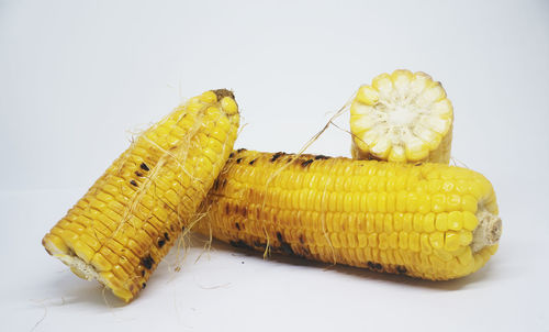 Close-up of lemon slice against white background