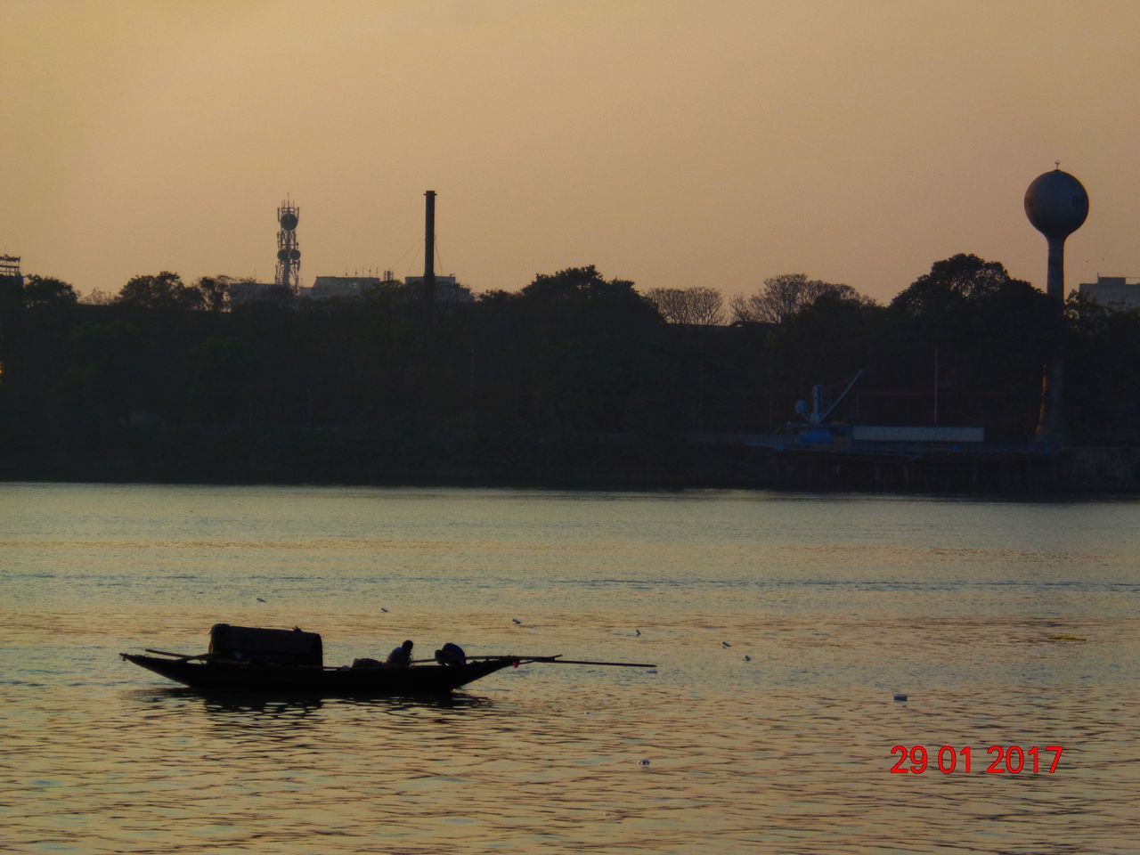 SILHOUETTE BOAT IN SEA AGAINST SUNSET SKY