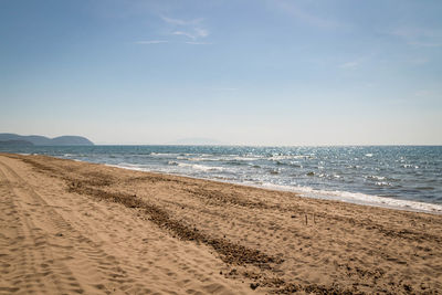 Scenic view of beach against sky