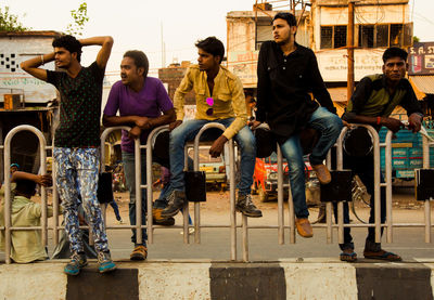 Friends standing on table