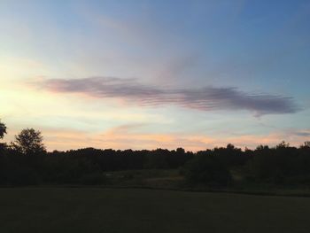 Scenic view of landscape at sunset