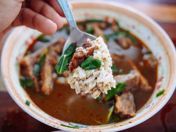 Close-up of hand holding food