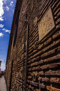 Low angle view of old building against sky