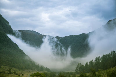 A beautiful green mountain valley near rosendal in norway. autumn landscape.