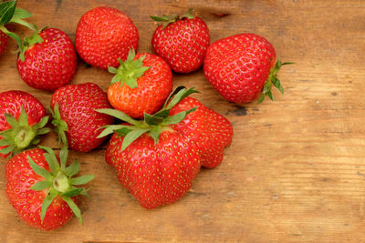 High angle view of strawberries on table