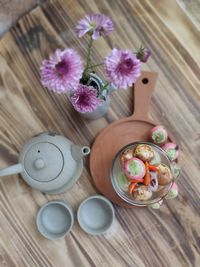 High angle view of pink roses on table