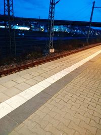 Railroad station platform at night