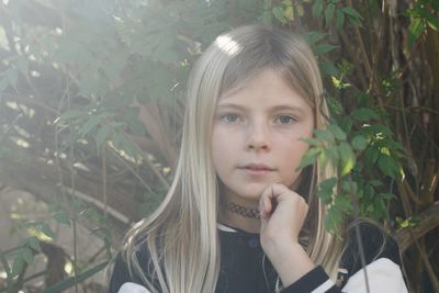 Portrait of a beautiful young woman outdoors